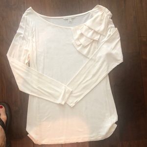 Long sleeve cream tee.